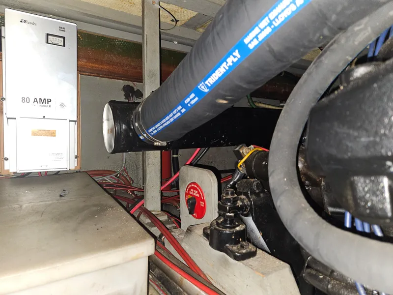 Slide: The Image of Engine room of 1978 Tollycraft 37 Sport Sedan with visible wiring and components. - 42