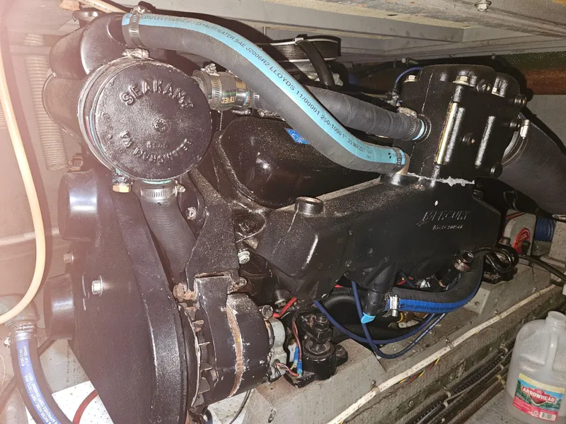 Slide: The Image of Engine compartment of a 1978 Tollycraft 37 Sport Sedan boat. - 43