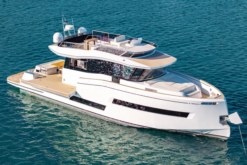 The Image of 2023 Pardo Yachts E60 luxury yacht cruising on clear blue water. - 0