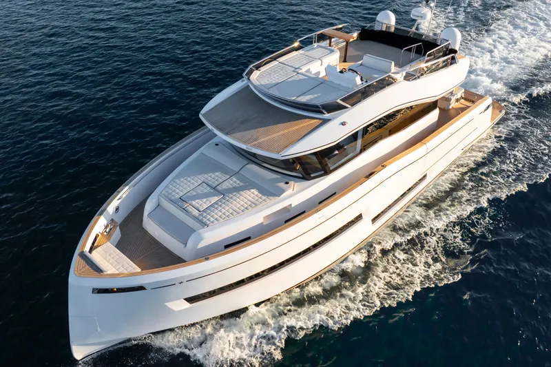 Slide: The Image of 2023 Pardo Yachts E60 luxury yacht on calm blue water. - 3