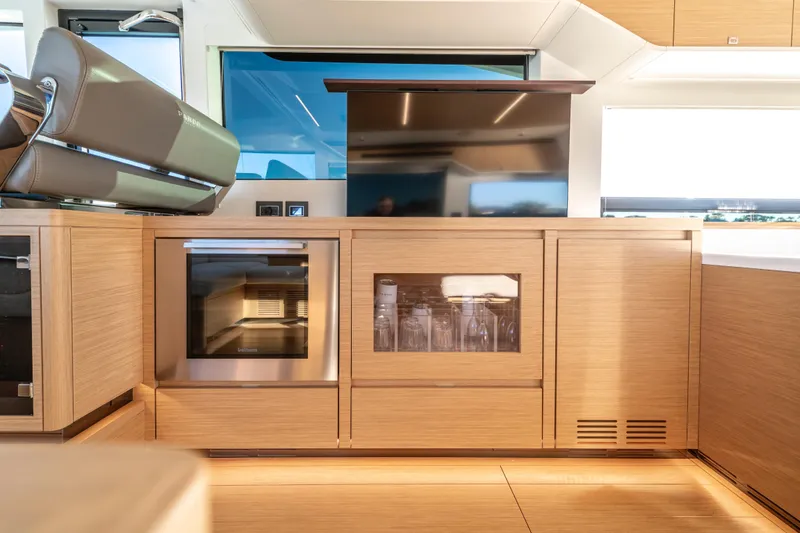 Slide: The Image of Luxurious interior of 2023 Pardo Yachts E60 with modern seating and large windows. - 30