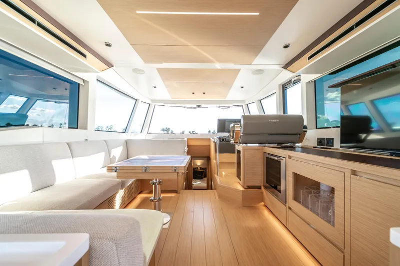 Slide: The Image of Luxurious interior of 2023 Pardo Yachts E60 with modern kitchen and scenic water view. - 32