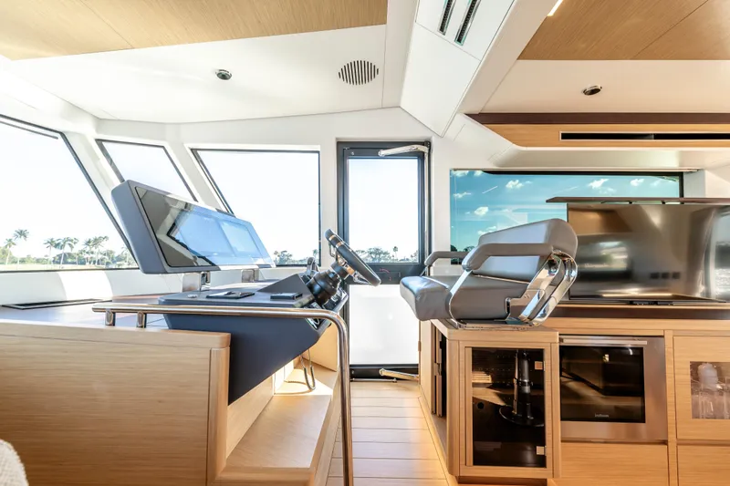 Slide: The Image of Luxurious interior of 2023 Pardo Yachts E60 with modern furnishings and panoramic windows. - 33