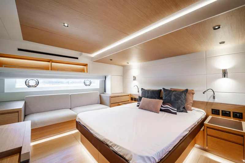 Slide: The Image of Luxurious interior of 2023 Pardo Yachts E60, featuring modern bedroom design and elegant furnishings. - 45