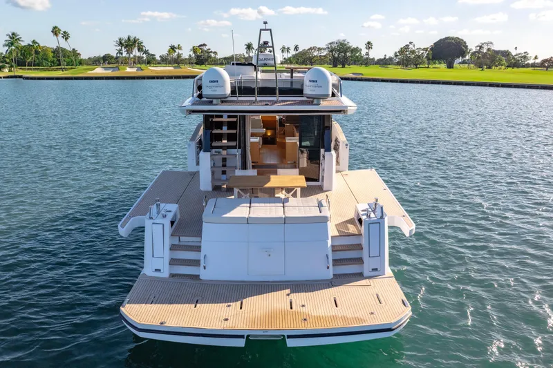 Slide: The Image of 2023 Pardo Yachts E60 luxury yacht on water, showcasing elegant design and spacious deck. - 18