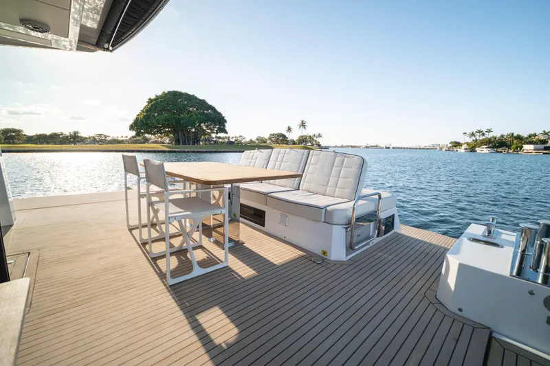 Slide: The Image of 2023 Pardo Yachts E60 luxury yacht deck with ocean view and modern interior. - 22