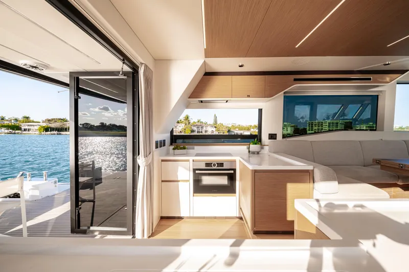 Slide: The Image of 2023 Pardo Yachts E60 deck with seating and ocean view. - 25