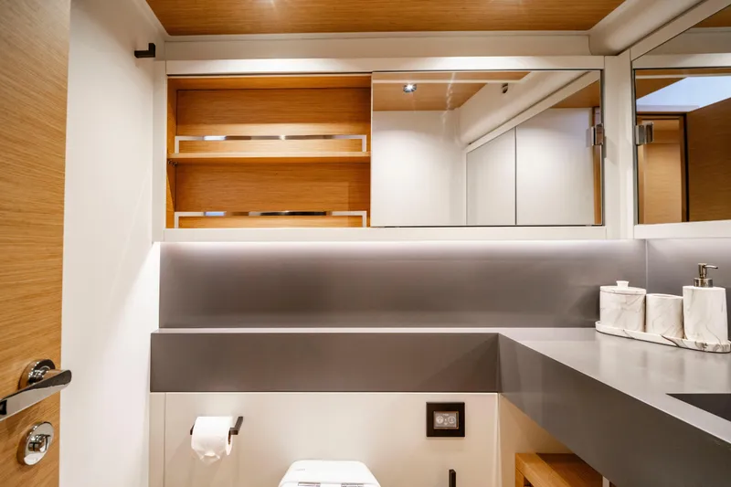 Slide: The Image of Modern bathroom interior of 2023 Pardo Yachts E60, featuring sleek design and wood accents. - 49