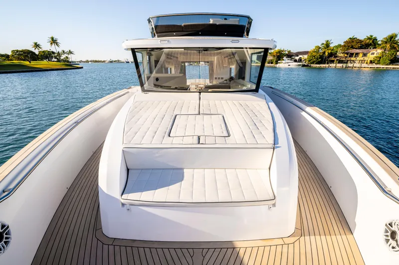 Slide: The Image of Luxurious 2023 Pardo Yachts E60 deck with elegant seating and scenic water view. - 53