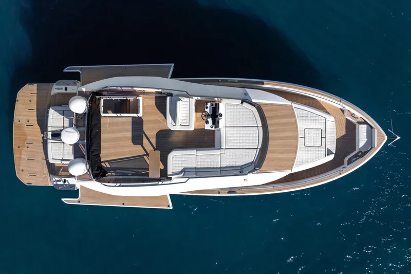 Slide: The Image of 2023 Pardo Yachts E60 luxury yacht with open deck and elegant interior design. - 7