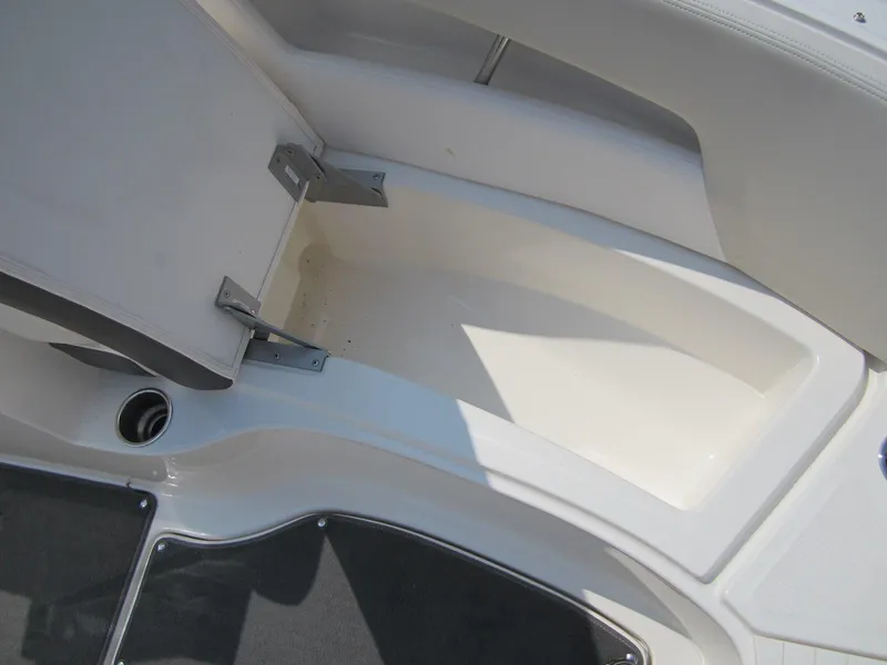 Slide: The Image of Storage compartment in 2012 Sea Ray 240 Sundeck boat. - 15