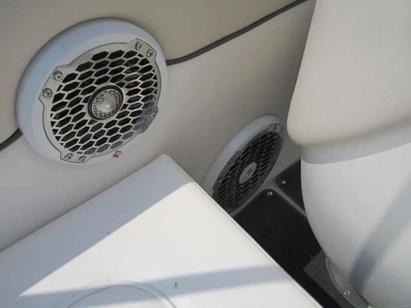 Slide: The Image of Speakers in a 2012 Sea Ray 240 Sundeck boat. - 23