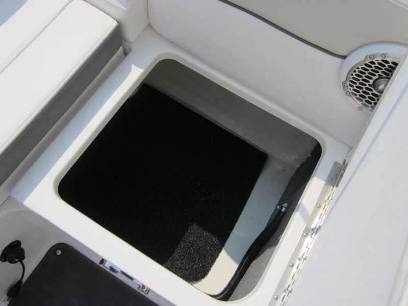 Slide: The Image of Storage compartment in 2012 Sea Ray 240 Sundeck boat. - 24