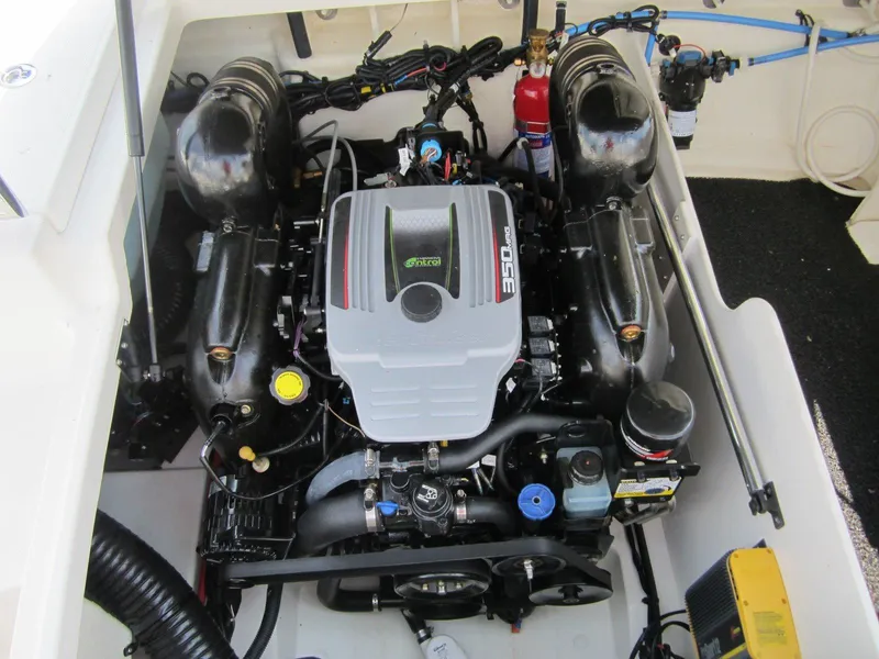 Slide: The Image of Engine compartment of a 2012 Sea Ray 240 Sundeck boat. - 33