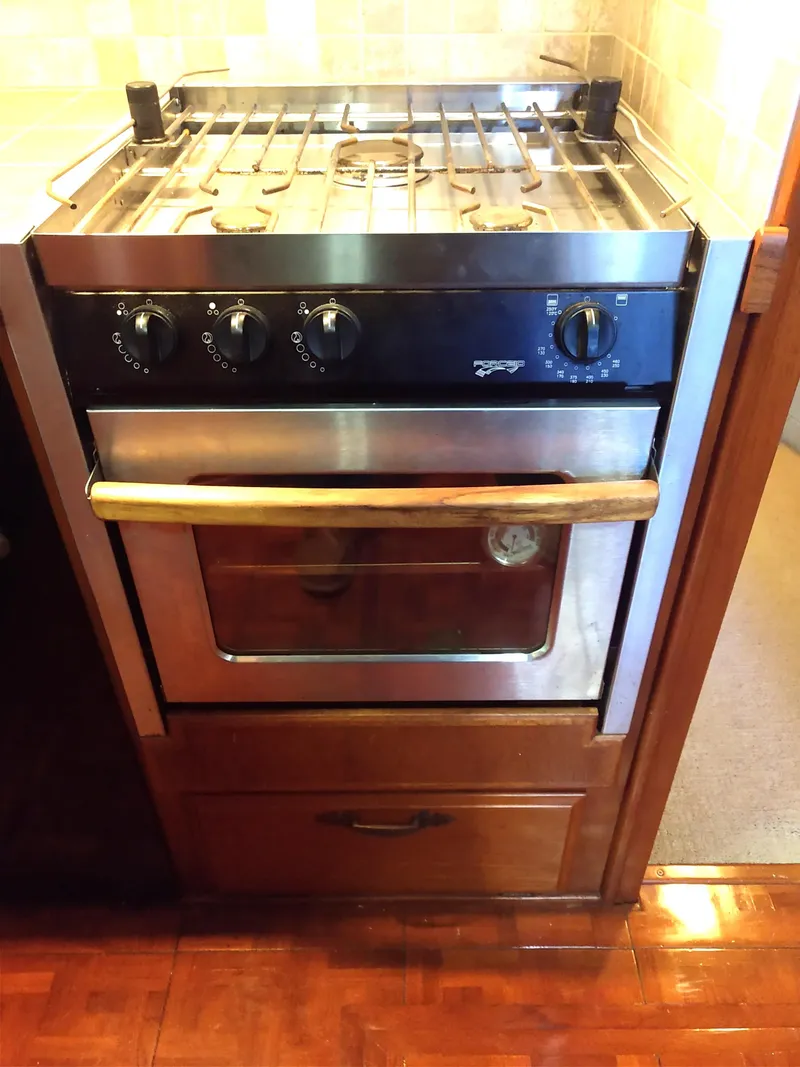 Slide: The Image of Stainless steel stove and oven in 1981 Tollycraft 43 Motoryacht kitchen. - 20