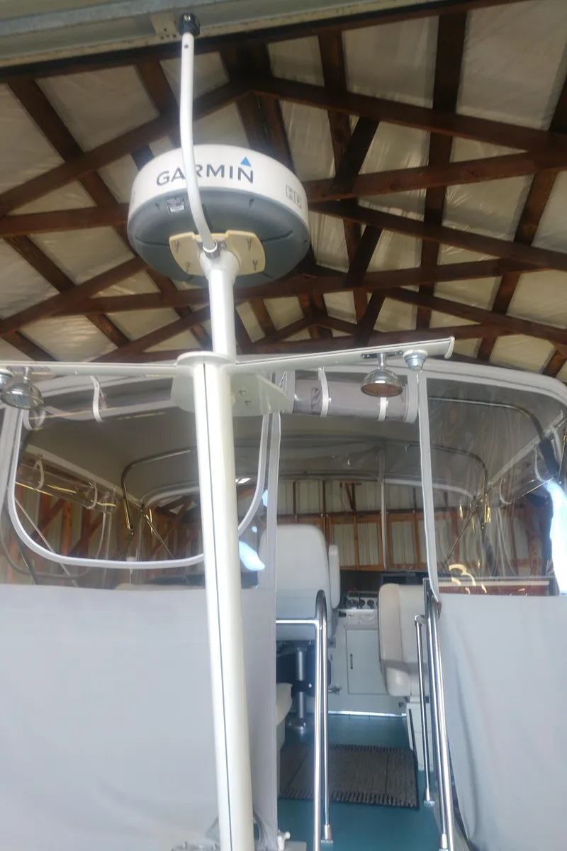 Slide: The Image of 1981 Tollycraft 43 Motoryacht with Garmin radar in a boathouse. - 38