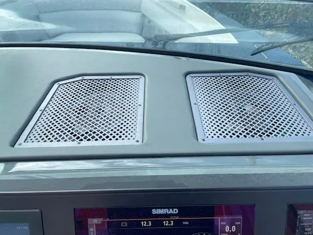 Slide: The Image of Dashboard of 2022 Aviara AV 32-OB boat with Simrad display and speaker grilles. - 18