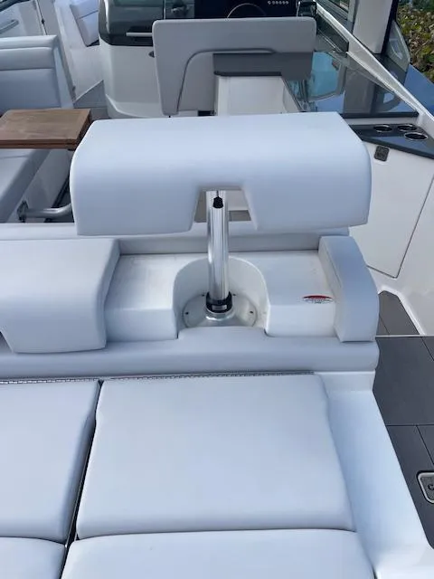 Slide: The Image of 2022 Aviara AV 32-OB boat interior with white cushioned seating and modern design. - 34
