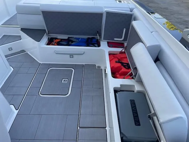 Slide: The Image of 2022 Aviara AV 32-OB boat interior with storage compartments and seating. - 20