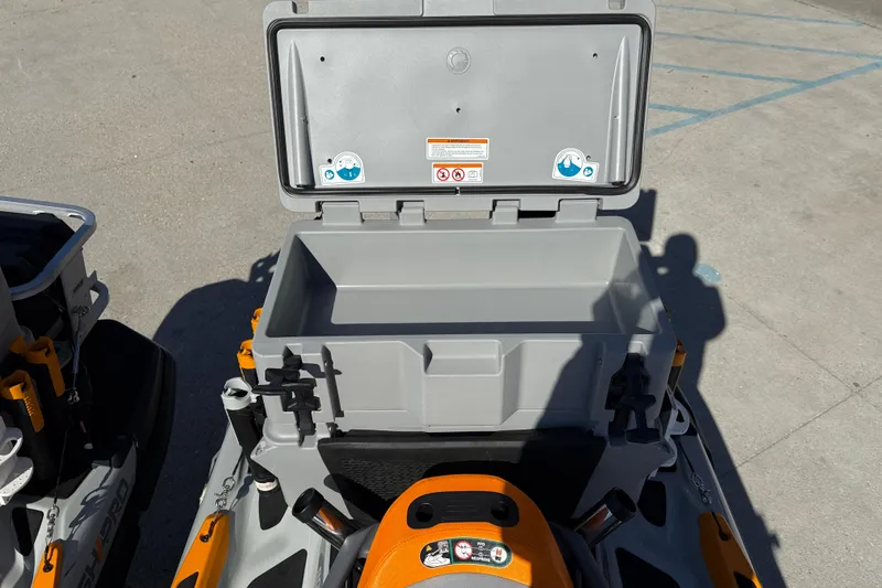 Slide: The Image of 2024 Sea-Doo FishPro Trophy 170 with open storage compartment, showcasing spacious interior design. - 15