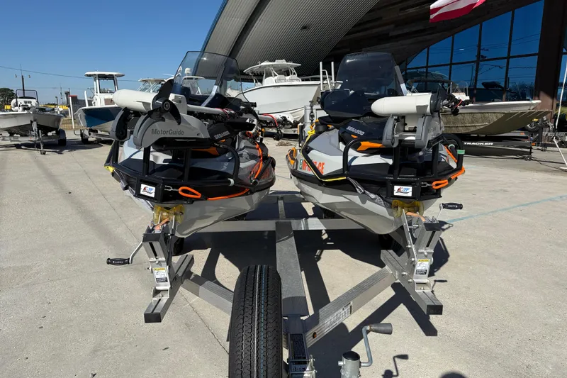 Slide: The Image of 2024 Sea-Doo FishPro Trophy 170 jet skis on trailers, ready for adventure. - 2