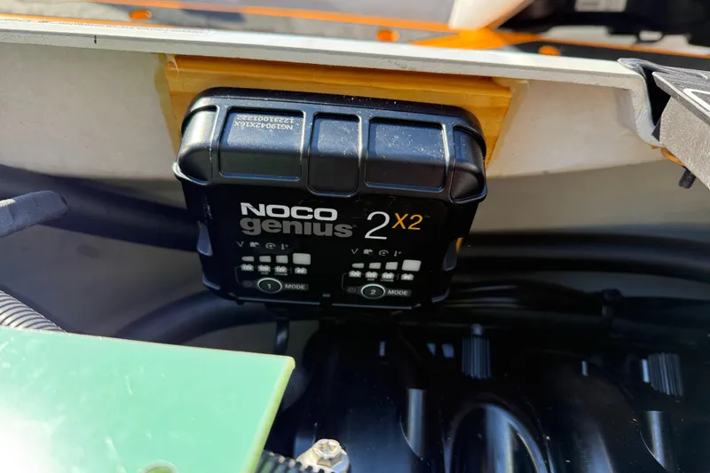 Slide: The Image of NOCO Genius 2X2 charger inside 2024 Sea-Doo FishPro Trophy 170 watercraft. - 21