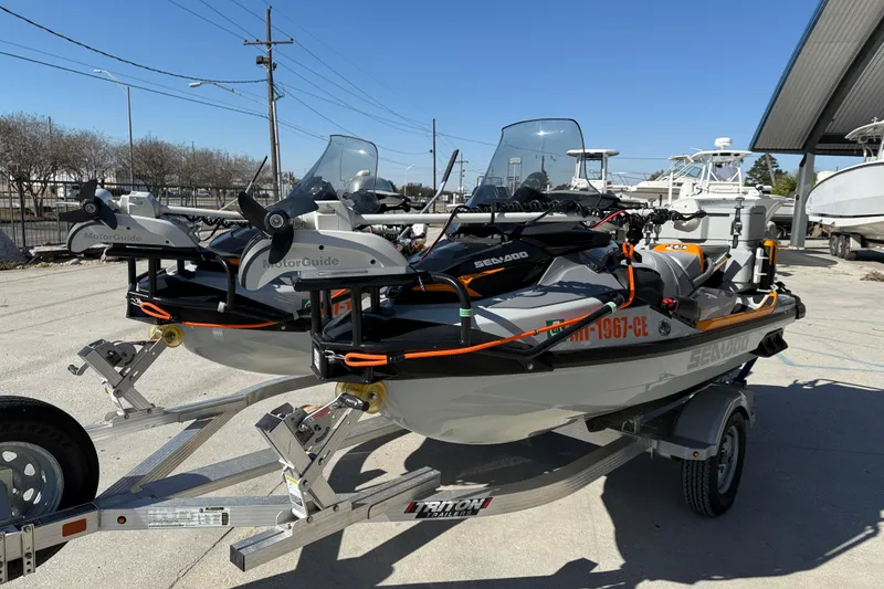 Slide: The Image of 2024 Sea-Doo FishPro Trophy 170 on trailer, equipped with MotorGuide motors. - 3