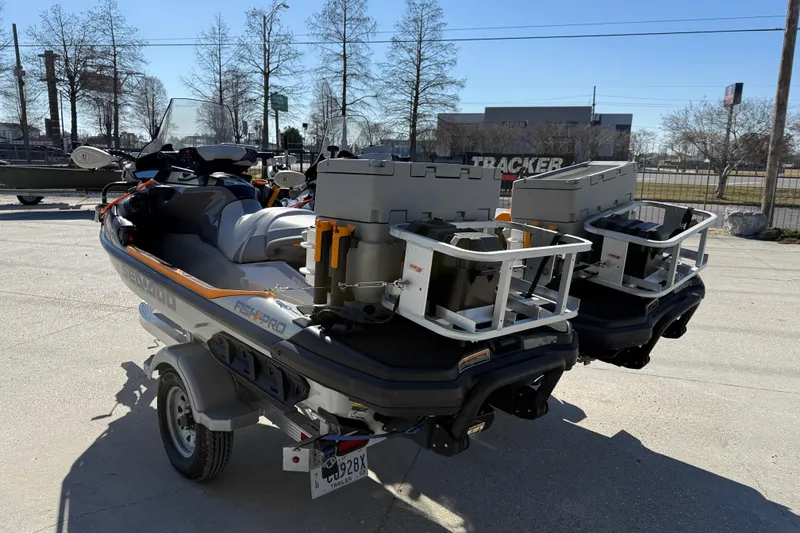 Slide: The Image of 2024 Sea-Doo FishPro Trophy 170 jet skis with fishing gear on trailer. - 4
