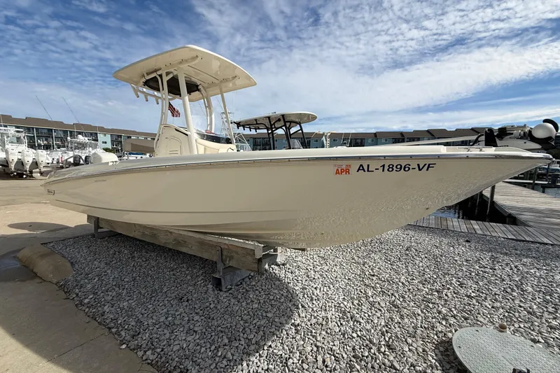 Slide: The Image of 2020 Boston Whaler 240 Dauntless boat on dock, clear sky background. - 4