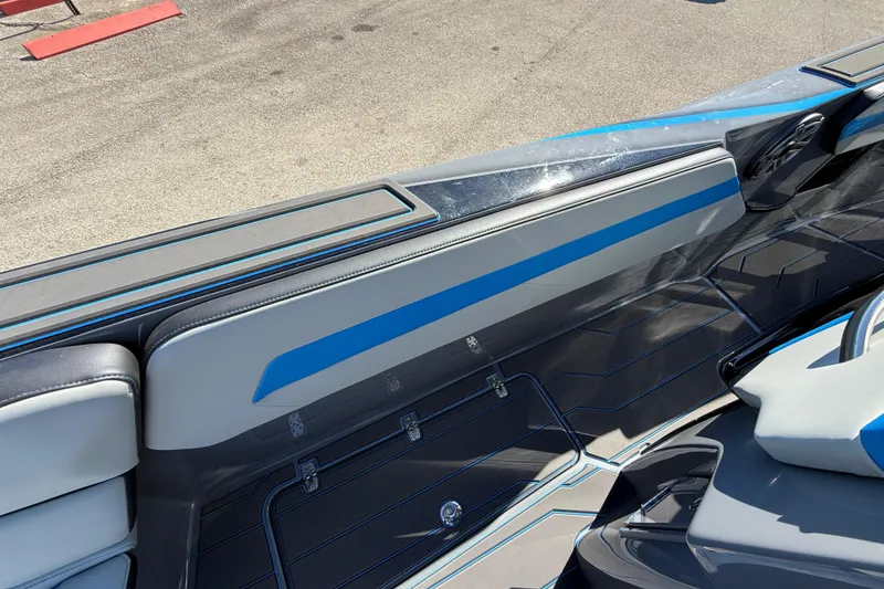Slide: The Image of 2026 Sunsation 32 CCX boat interior with sleek blue and gray design. - 20