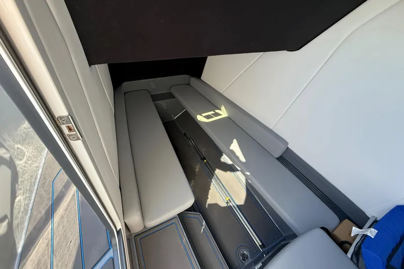 Slide: The Image of 2026 Sunsation 32 CCX cabin interior with sleek gray seating and modern design. - 26
