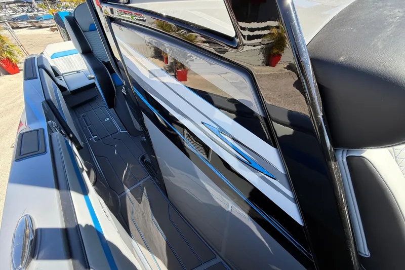 Slide: The Image of 2026 Sunsation 32 CCX boat interior with sleek design and modern seating. - 38