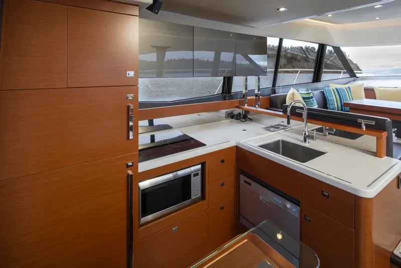 Slide: The Image of Luxurious kitchen interior of 2017 Prestige 560 yacht with modern appliances and sleek design. - 13