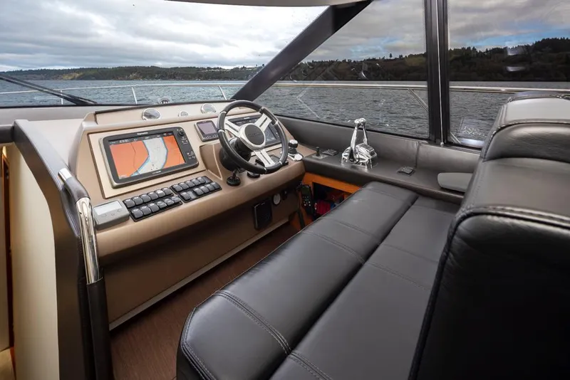 Slide: The Image of Luxurious interior of a 2017 Prestige 560 yacht with modern navigation system. - 19