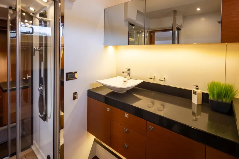 Slide: The Image of Luxurious bathroom interior of 2017 Prestige 560 yacht with modern sink and elegant design. - 26