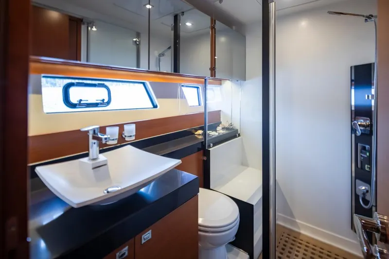 Slide: The Image of Luxurious bathroom in 2017 Prestige 560 yacht with modern fixtures and sleek design. - 35
