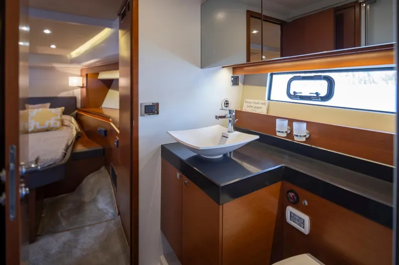 Slide: The Image of Luxurious bathroom and bedroom interior of a 2017 Prestige 560 yacht. - 36