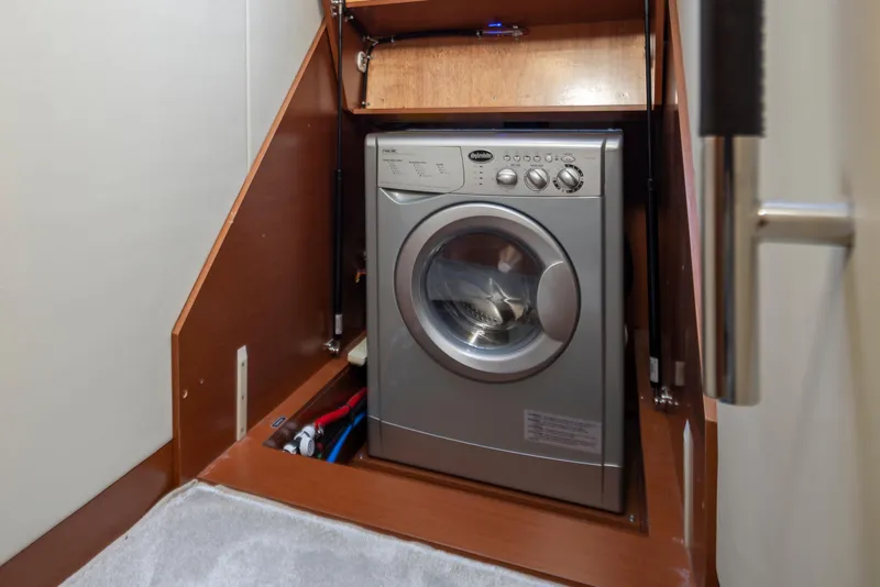 Slide: The Image of Compact washing machine in a 2017 Prestige 560 yacht interior. - 39