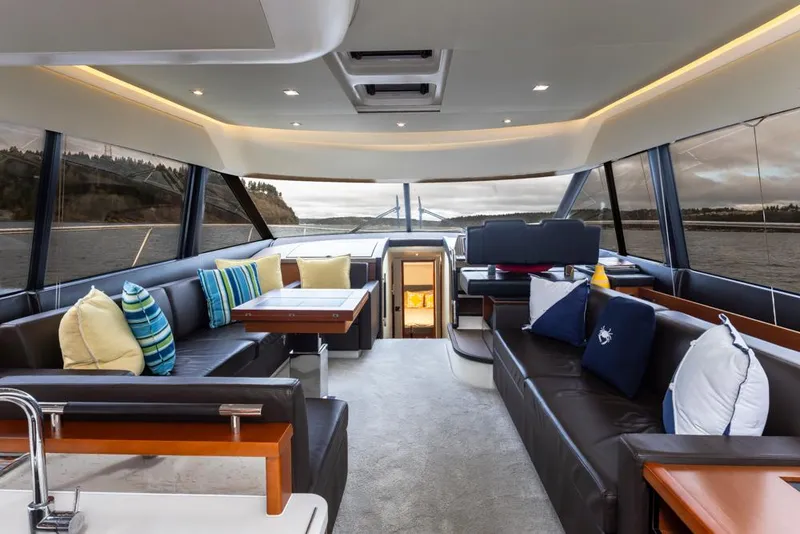 Slide: The Image of Luxurious interior of 2017 Prestige 560 yacht with elegant seating and scenic views. - 9