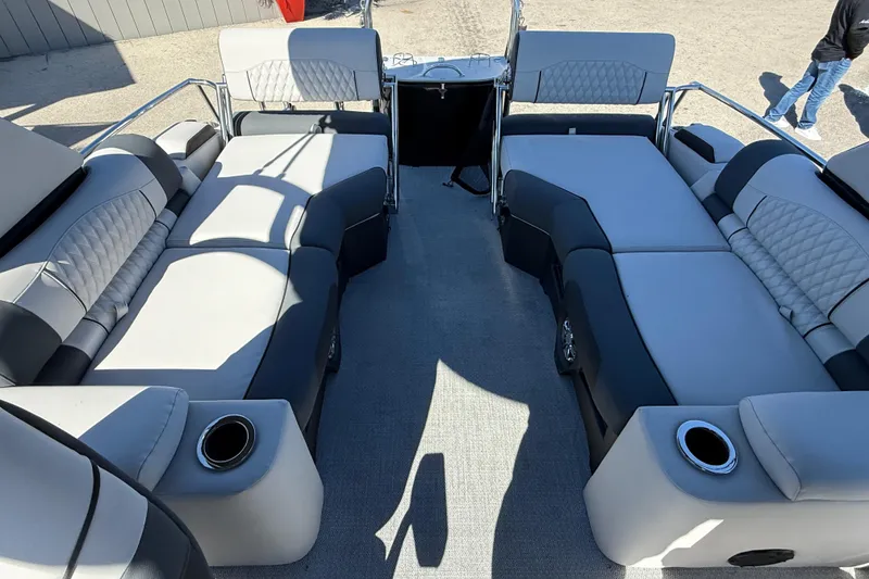 Slide: The Image of 2026 Avalon 2385 Catalina Quad Lounger interior with plush seating and cup holders. - 18