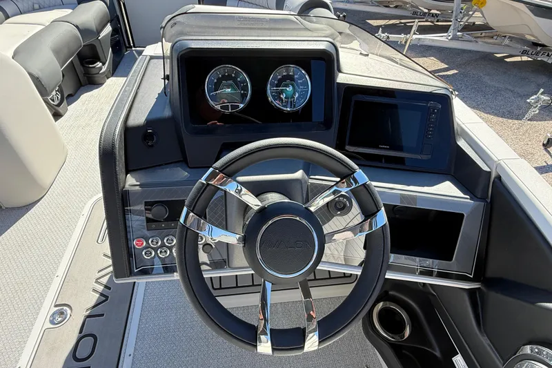 Slide: The Image of Steering console of 2026 Avalon 2385 Catalina Quad Lounger, featuring modern controls and displays. - 22
