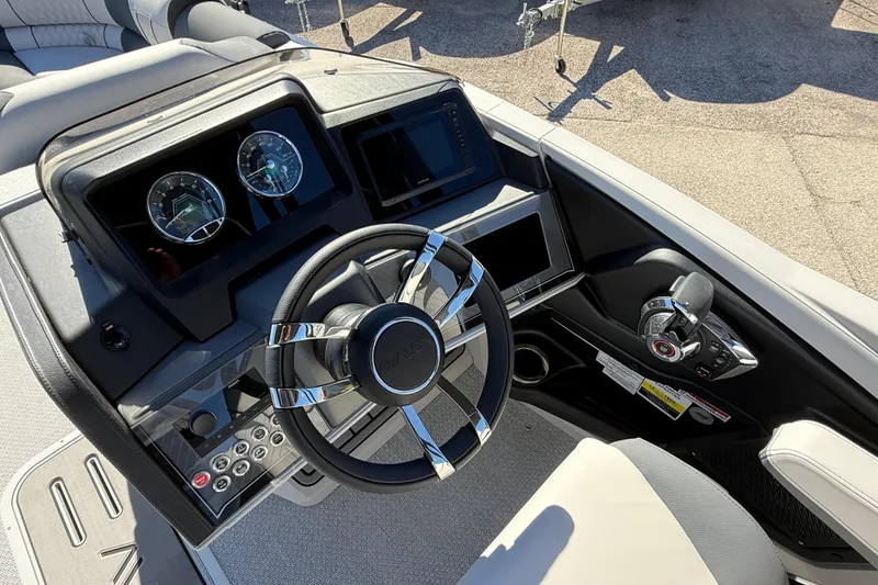 Slide: The Image of Steering console of 2026 Avalon 2385 Catalina Quad Lounger, featuring modern controls and gauges. - 23