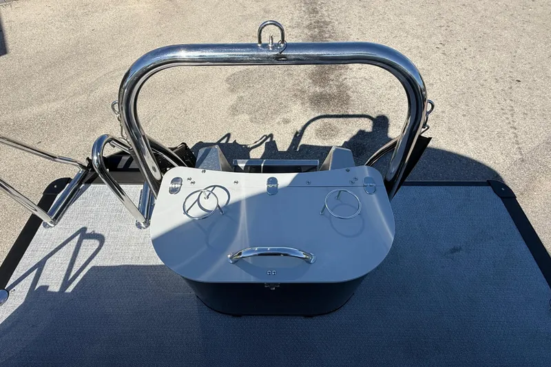 Slide: The Image of 2026 Avalon 2385 Catalina Quad Lounger boat helm with stainless steel railings. - 27