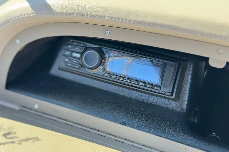 Slide: The Image of Dashboard stereo system in a 2005 Cobalt 200 boat, featuring Bluetooth connectivity. - 22
