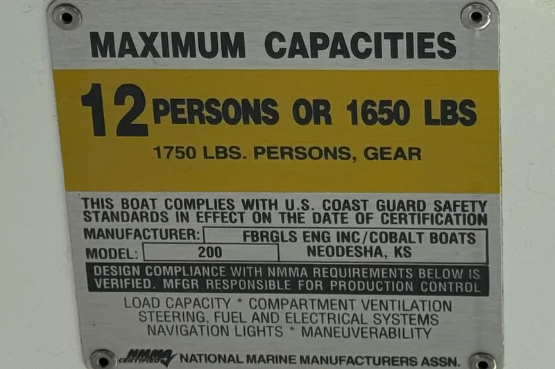 Slide: The Image of Capacity plate for Cobalt 200 boat, 2005 model, max 12 persons or 1650 lbs. - 28