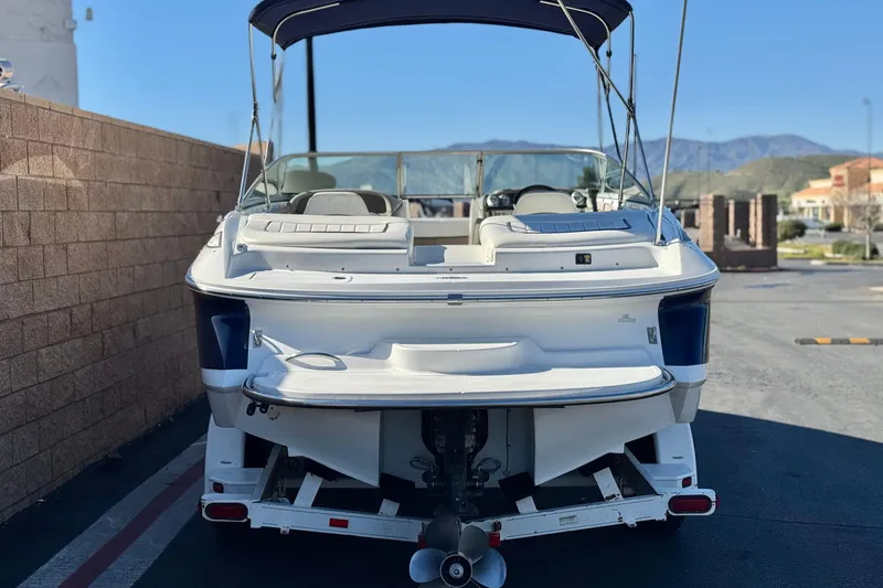 Slide: The Image of 2005 Cobalt 200 boat on trailer, rear view, parked outdoors. - 4