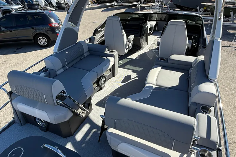 Slide: The Image of 2026 Avalon 2385 Catalina Windshield Quade Lounger, Tri Toon, high-performance interior view. - 11