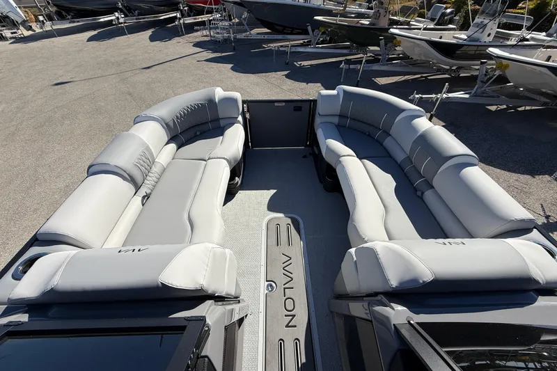 Slide: The Image of 2026 Avalon 2385 Catalina Windshield Quade Lounger, Tri Toon boat interior with luxurious seating. - 19