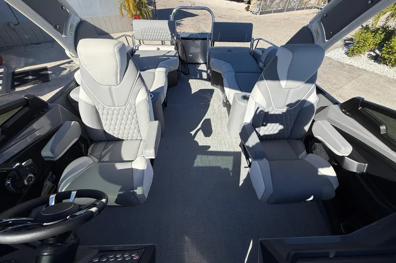 Slide: The Image of 2026 Avalon 2385 Catalina Windshield Quade Lounger interior with luxurious seating and modern design. - 21