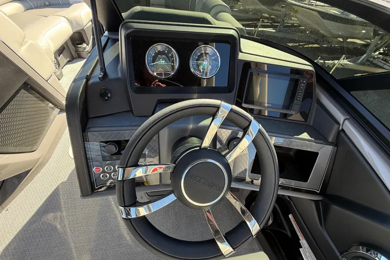 Slide: The Image of Steering console of 2026 Avalon 2385 Catalina Windshield Quade Lounger, featuring modern controls. - 25